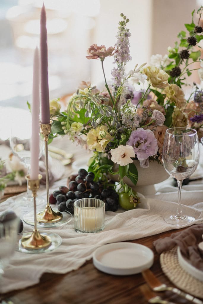 Romantic garden-style wedding flowers featuring mauve, blush, plum, and buttery yellow florals