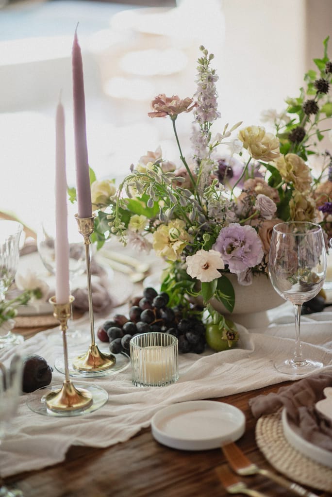 Romantic garden-style wedding flowers featuring mauve, blush, plum, and buttery yellow florals