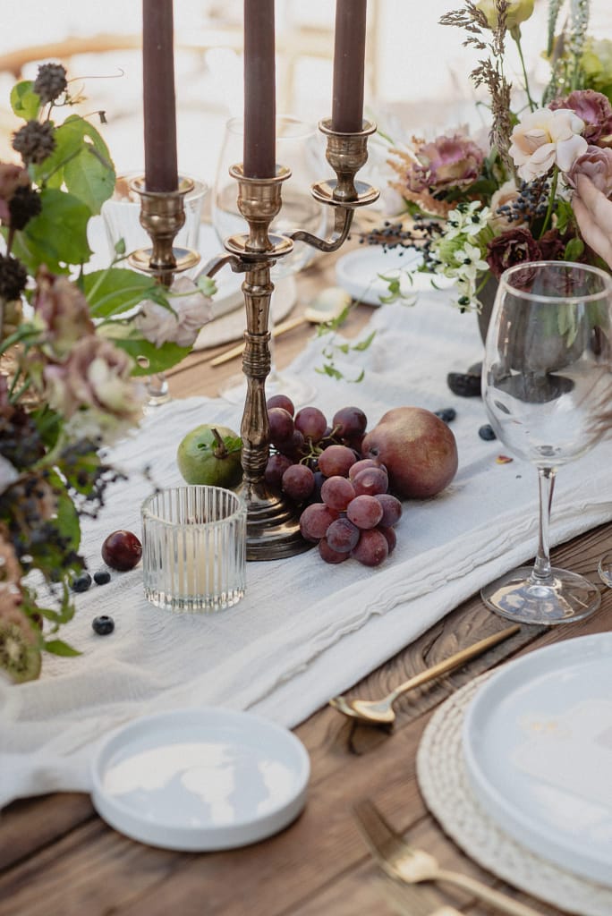 Romantic garden-style wedding flowers featuring mauve, blush, plum, and buttery yellow florals