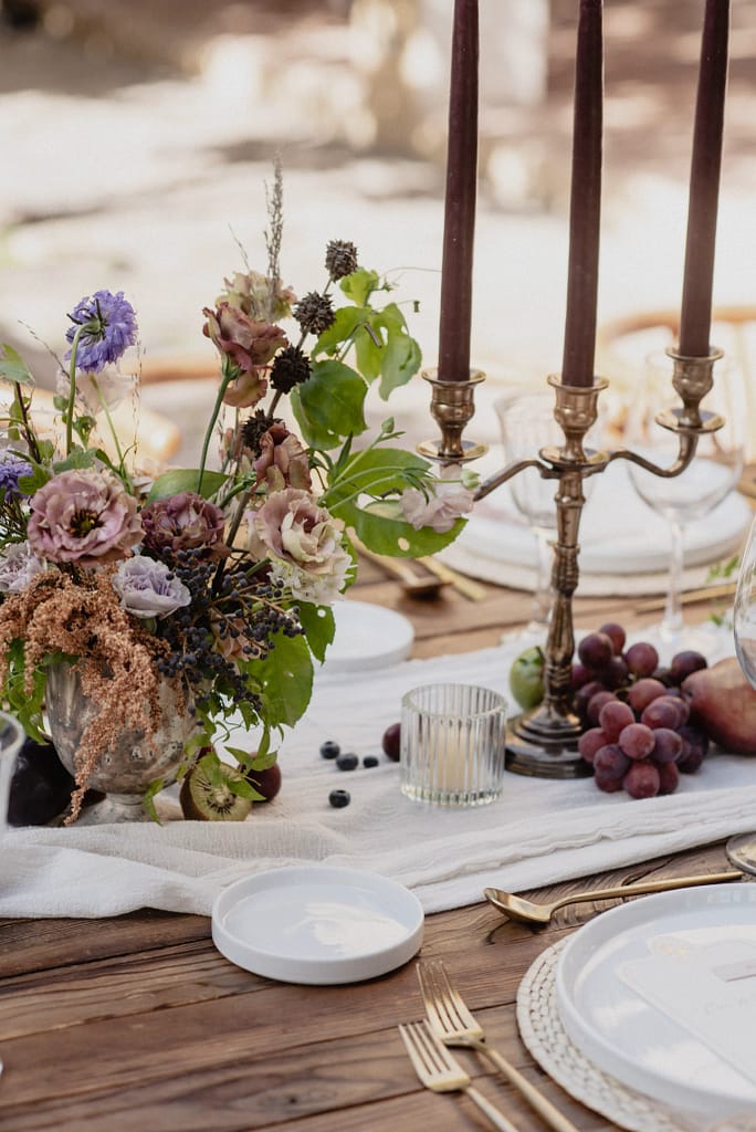 Romantic garden-style wedding flowers featuring mauve, blush, plum, and buttery yellow florals