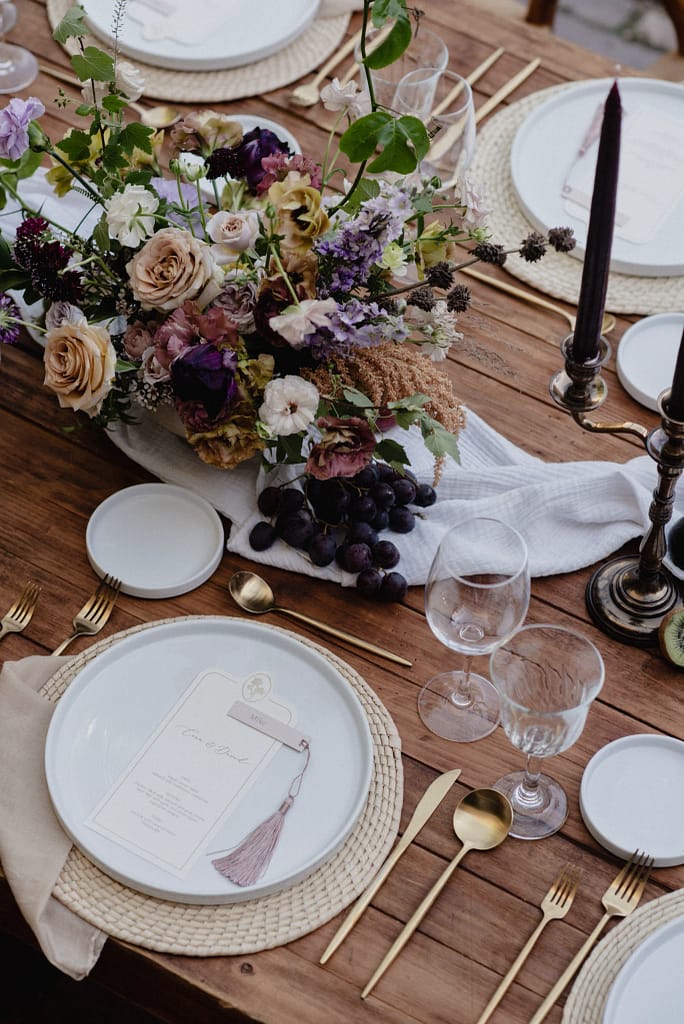 Romantic garden-style wedding flowers featuring mauve, blush, plum, and buttery yellow florals, Mexico Wedding