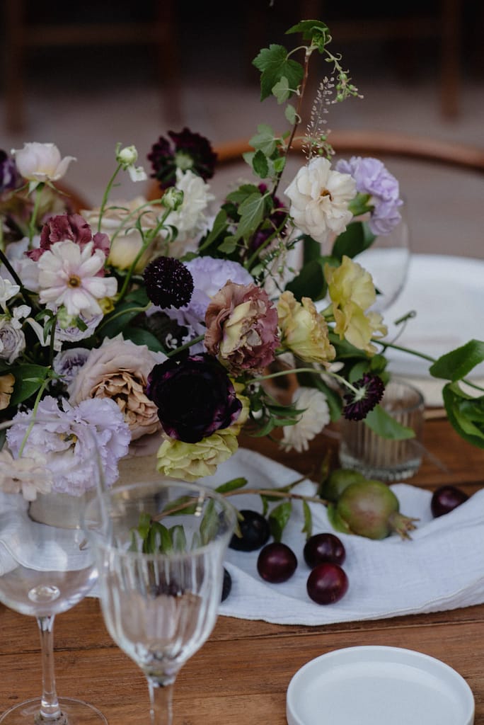 Romantic garden-style wedding flowers featuring mauve, blush, plum, and buttery yellow florals, Mexico Wedding