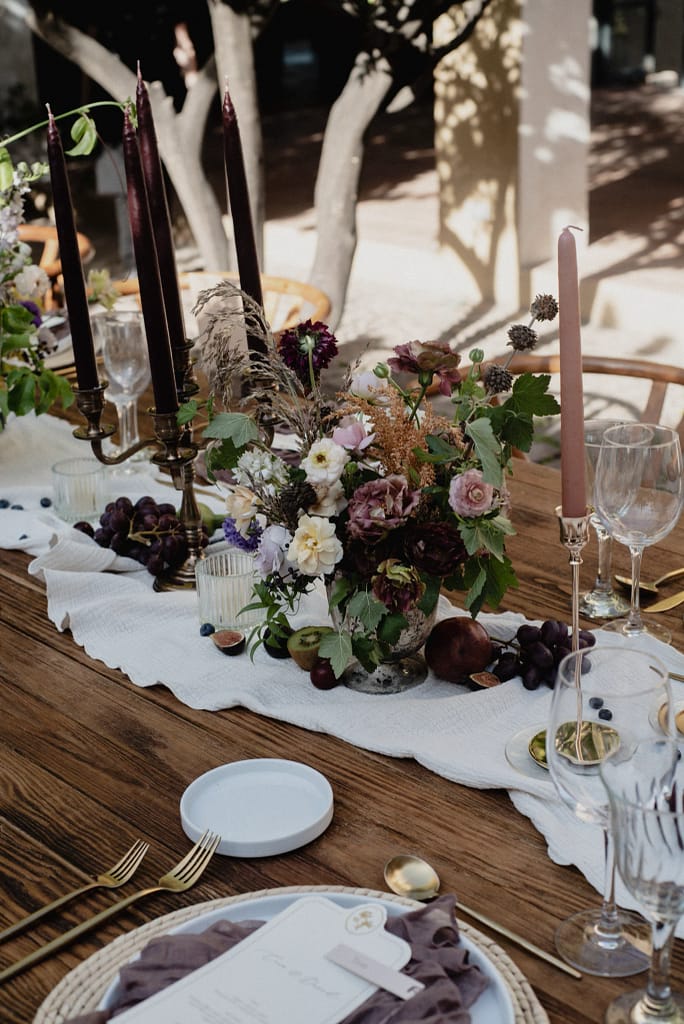 Romantic garden-style wedding flowers featuring mauve, blush, plum, and buttery yellow florals, Mexico Wedding