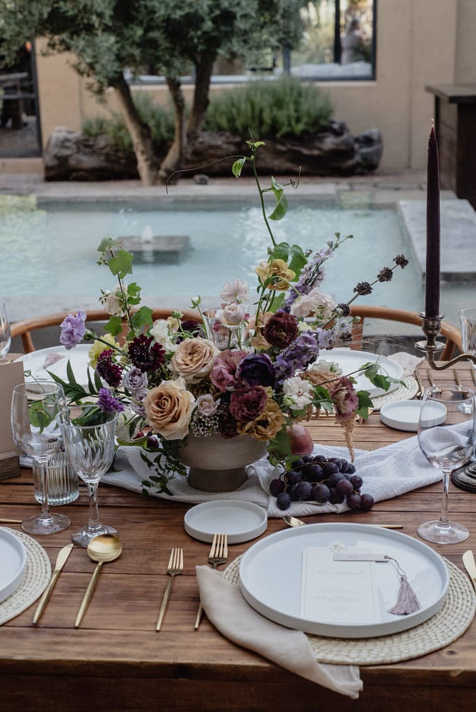 Romantic garden-style wedding flowers featuring mauve, blush, plum, and buttery yellow florals, Mexico Wedding