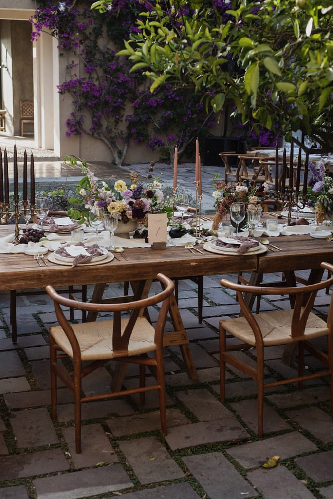 Romantic garden-style wedding flowers featuring mauve, blush, plum, and buttery yellow florals, Mexico Wedding
