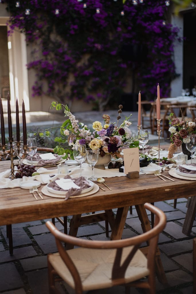 Romantic garden-style wedding flowers featuring mauve, blush, plum, and buttery yellow florals, Mexico Wedding