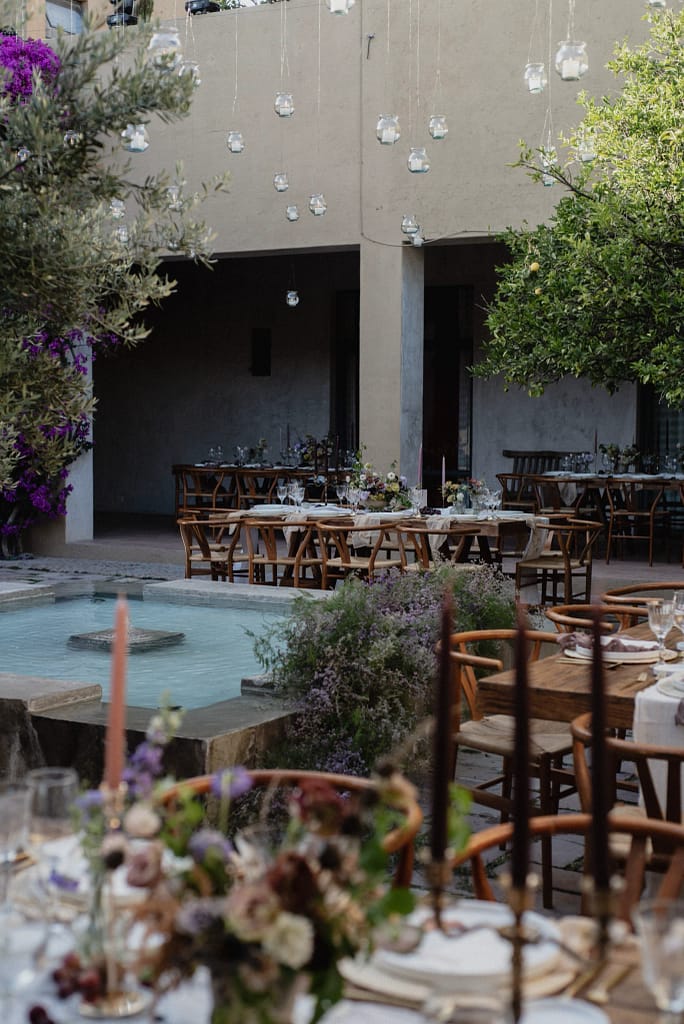 Romantic garden-style wedding flowers featuring mauve, blush, plum, and buttery yellow florals, Mexico Wedding