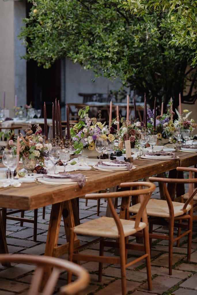 Romantic garden-style wedding flowers featuring mauve, blush, plum, and buttery yellow florals, Mexico Wedding