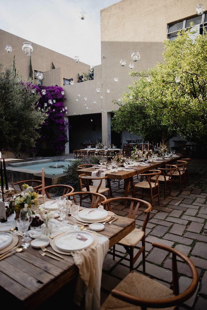 Romantic garden-style wedding flowers featuring mauve, blush, plum, and buttery yellow florals, Mexico Wedding