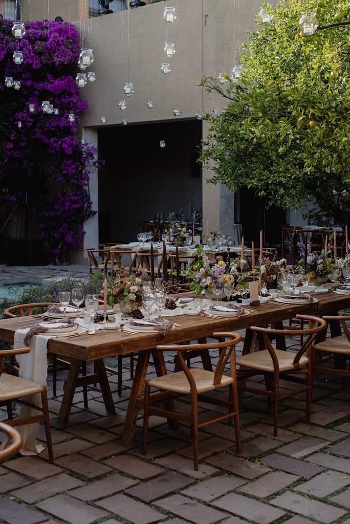 Romantic garden-style wedding flowers featuring mauve, blush, plum, and buttery yellow florals, Mexico Wedding