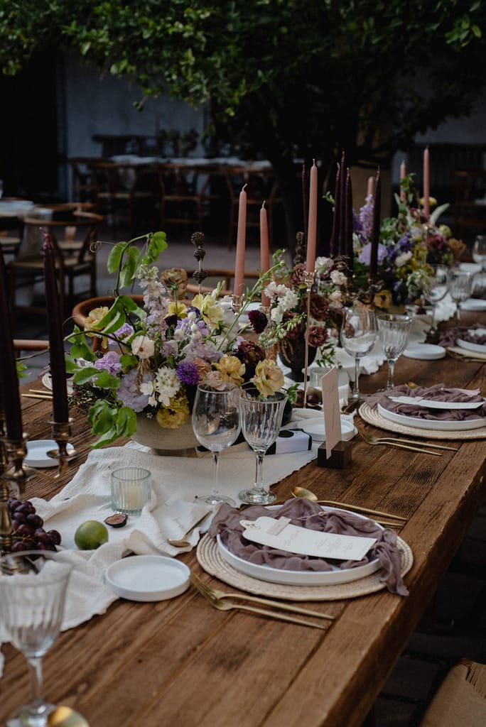 Romantic garden-style wedding flowers featuring mauve, blush, plum, and buttery yellow florals, Mexico Wedding