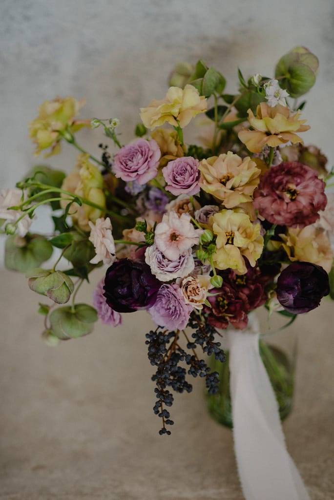garden-style wedding in Mexico, ranunculus and lisianthus bouquet, luxury wedding flowers Mexico